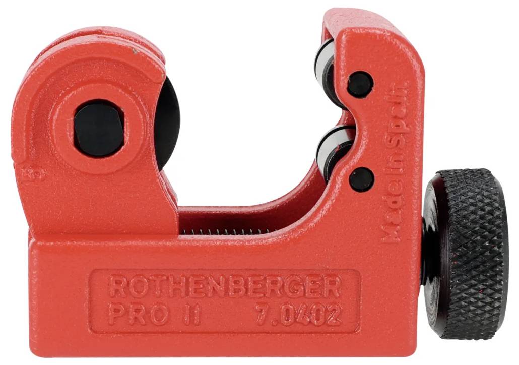 A red pipe cutter with 'Made in Spain' and 'Rothenberger Pro II' visible on its body, featuring a turn knob and cutting wheel.