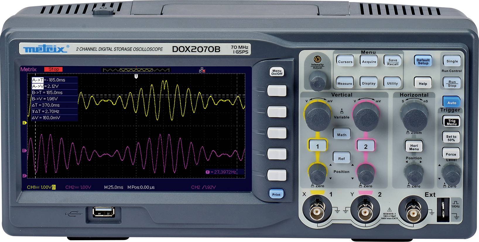 A digital storage oscilloscope displays two waveform signals on the screen. The control panel contains buttons and ports.