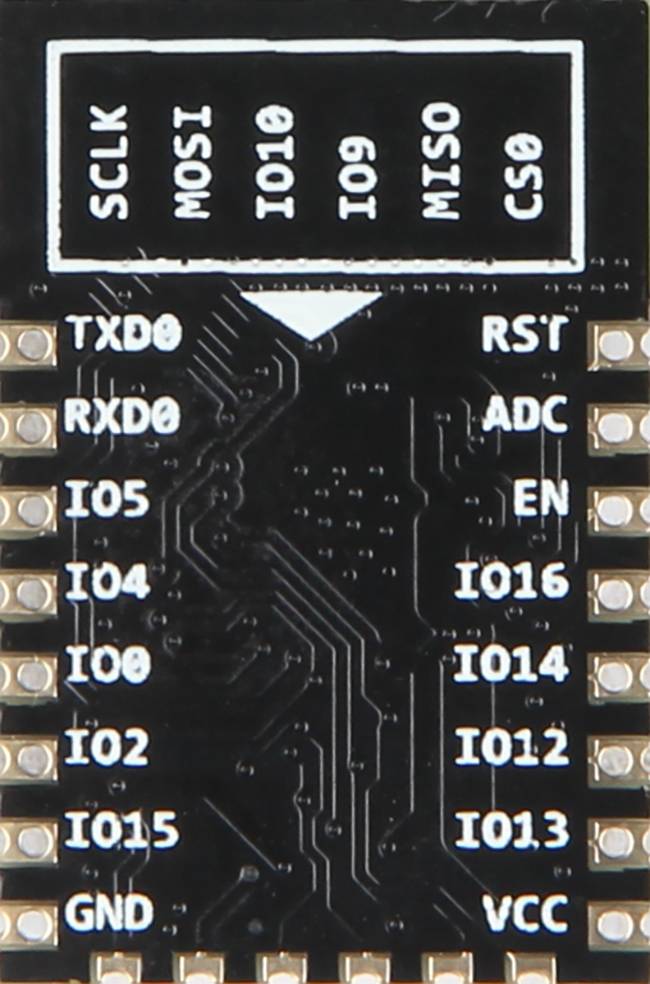 Black microcontroller module with white cable labels: SCLK, MOSI, MISO, CS0, I0-15, TXD0, RXD0 and connections GND, VCC.