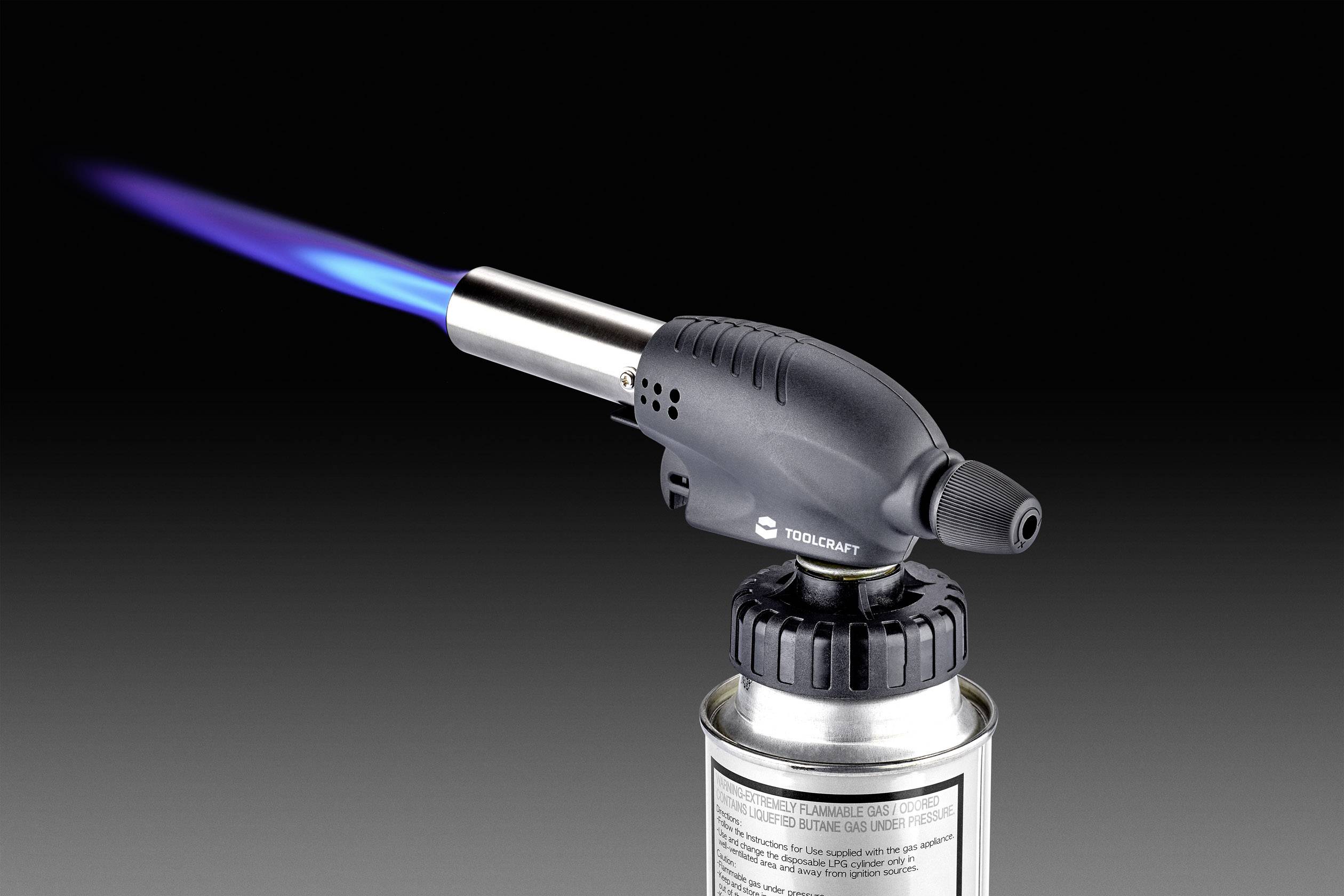 A blow torch with a blue flame, mounted on a metal gas canister. Suitable for precise tasks such as soldering or caramelising.