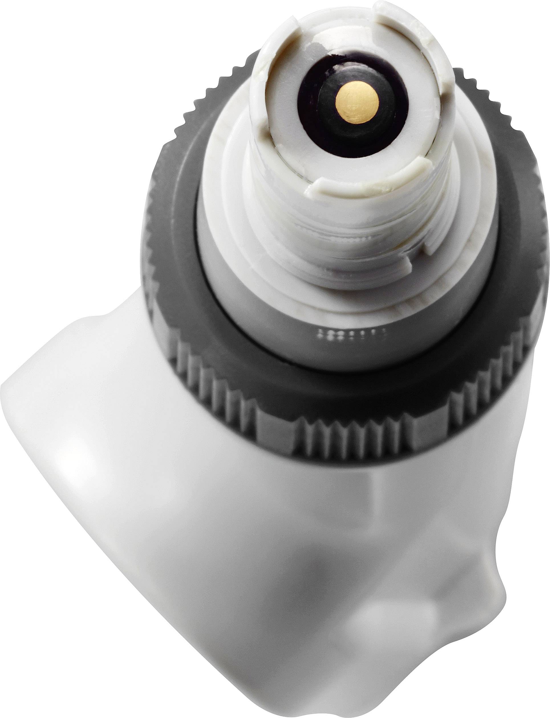 Close-up of a white, rectangular bottle cap with a round, black opening in the centre, surrounded by a grey border.