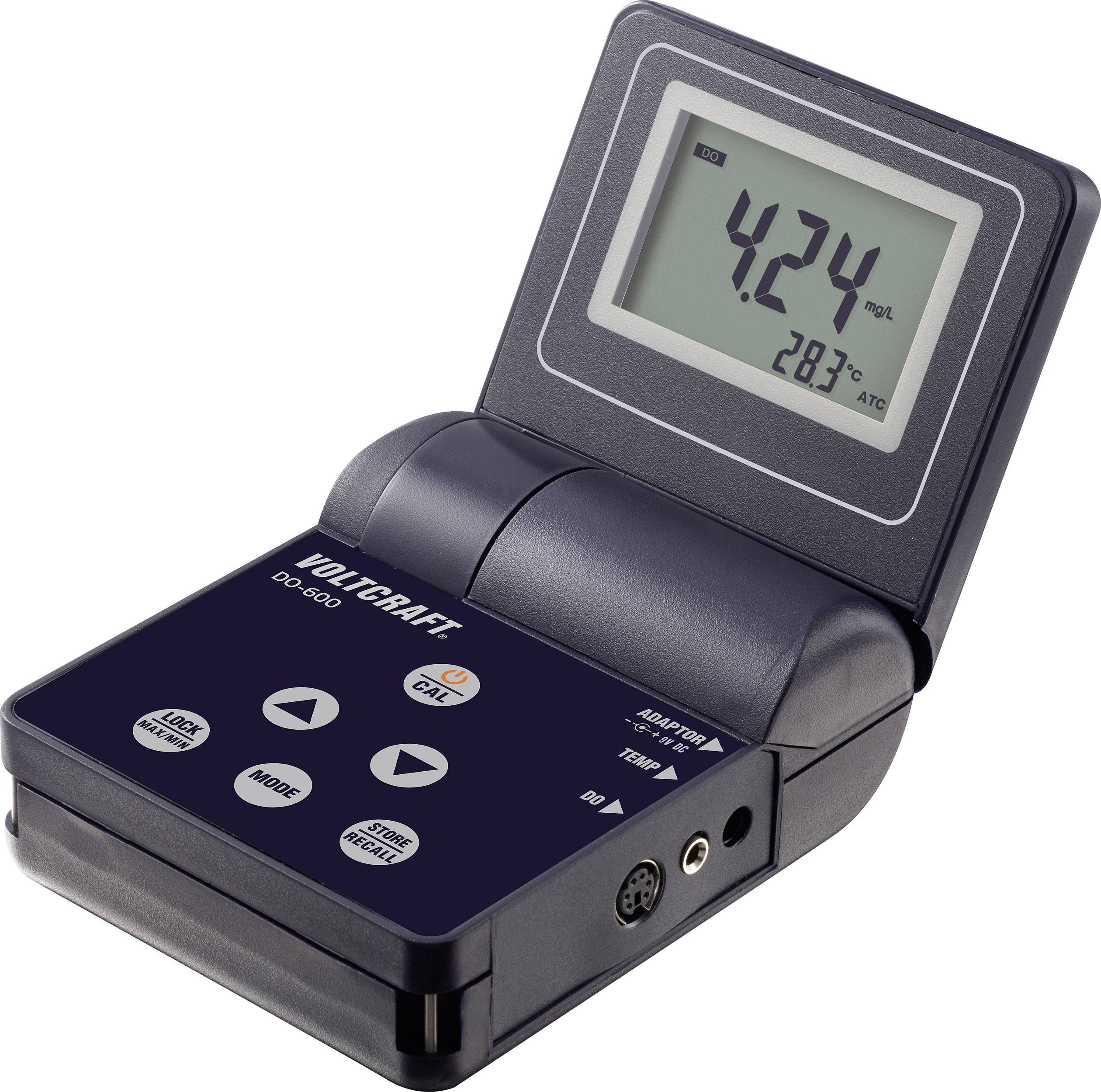 Digital multimeter with display, showing measurement value '4.24' and temperature '28.3°C'. Function buttons 'MODE', 'HOLD', 'MAX/MIN'.