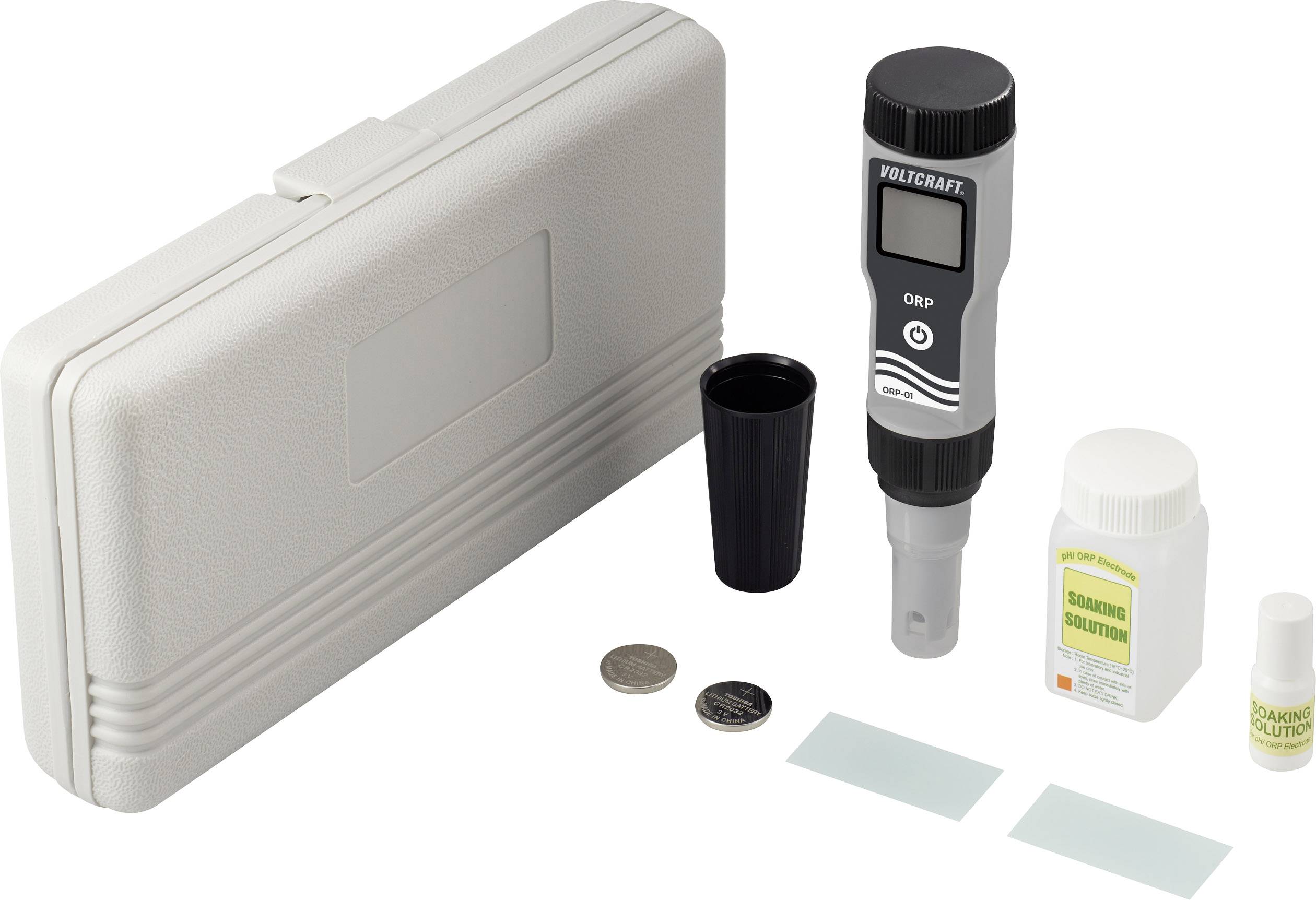 Digital pH measuring device with accessories, including solution, test strips, a coin and a storage box.