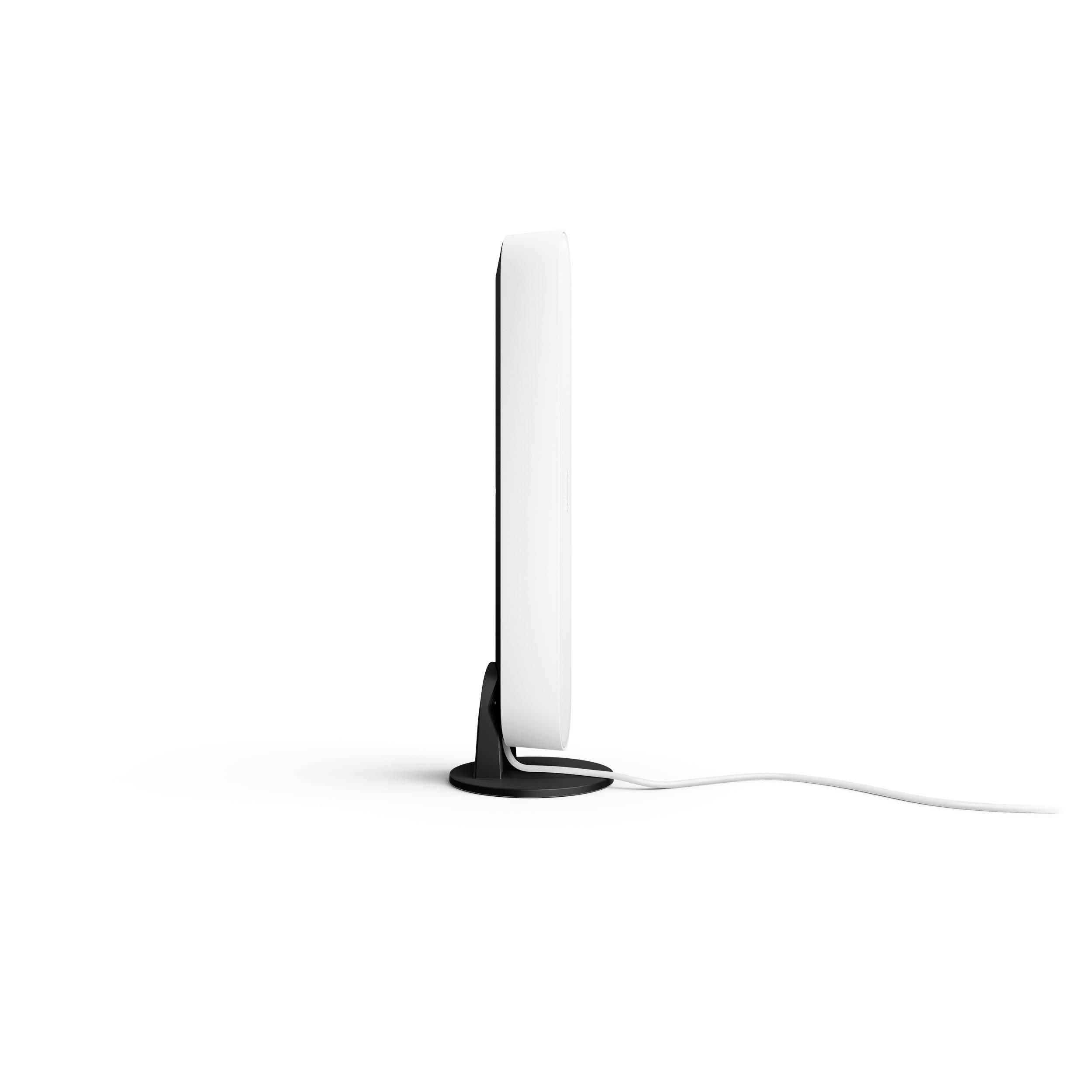 A slim, vertical monitor with a black stand and white bezel. A white cable runs away from the right side.
