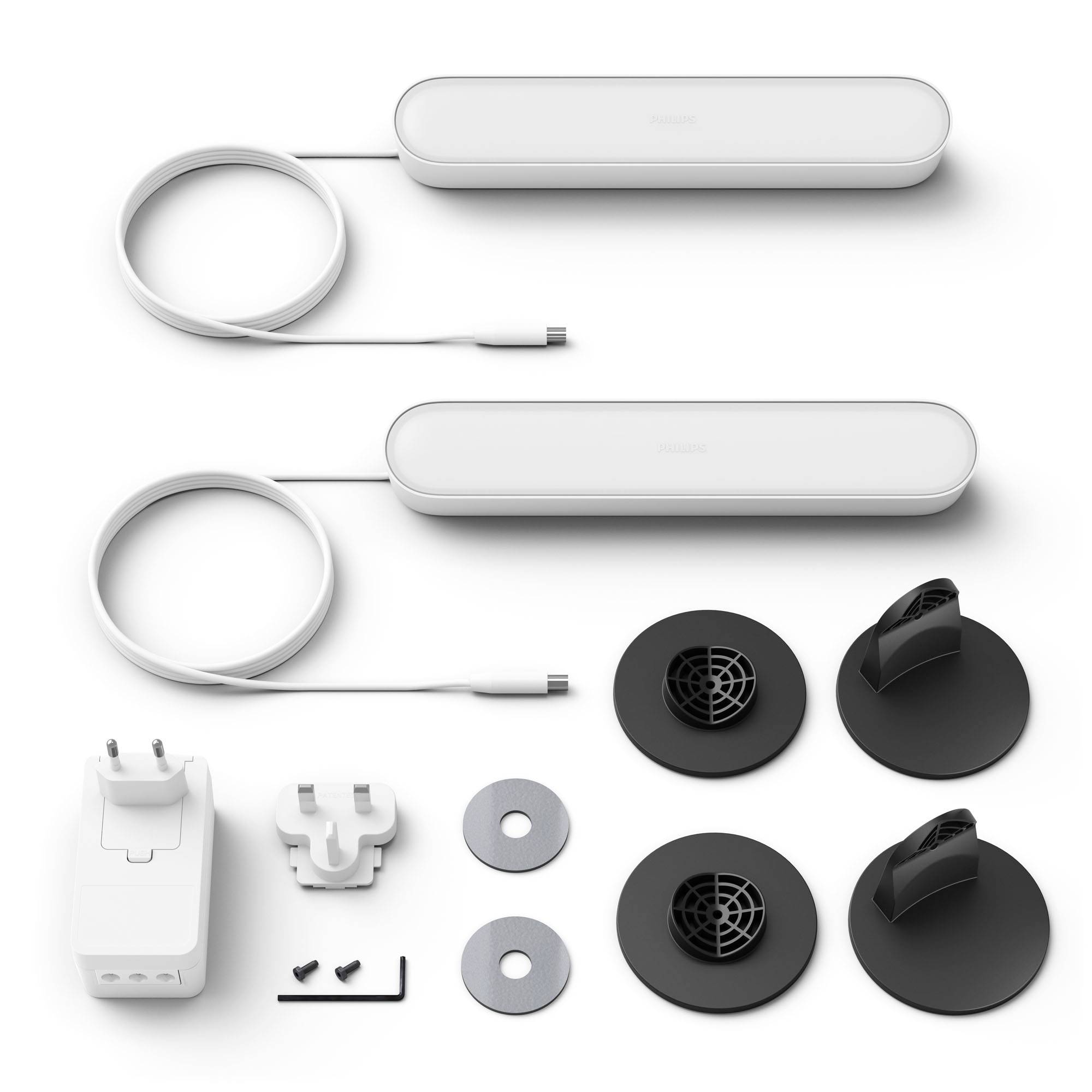 Two elongated LED lights, power supply, cables, mounting brackets and installation materials on a white background. Components for installation.
