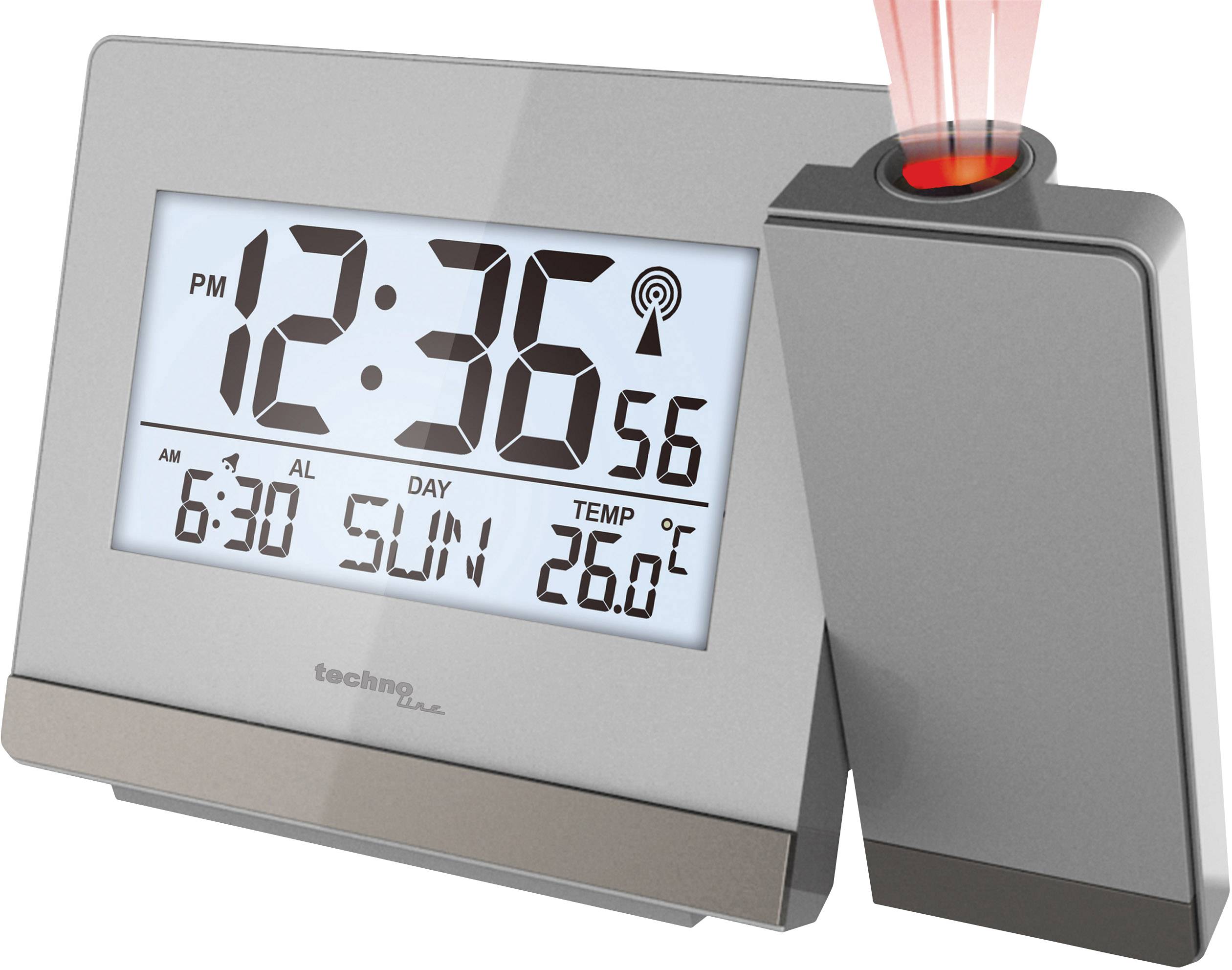 A silver digital alarm clock shows the time as 12:36, the day as Sunday, and a temperature of 26.0°C.