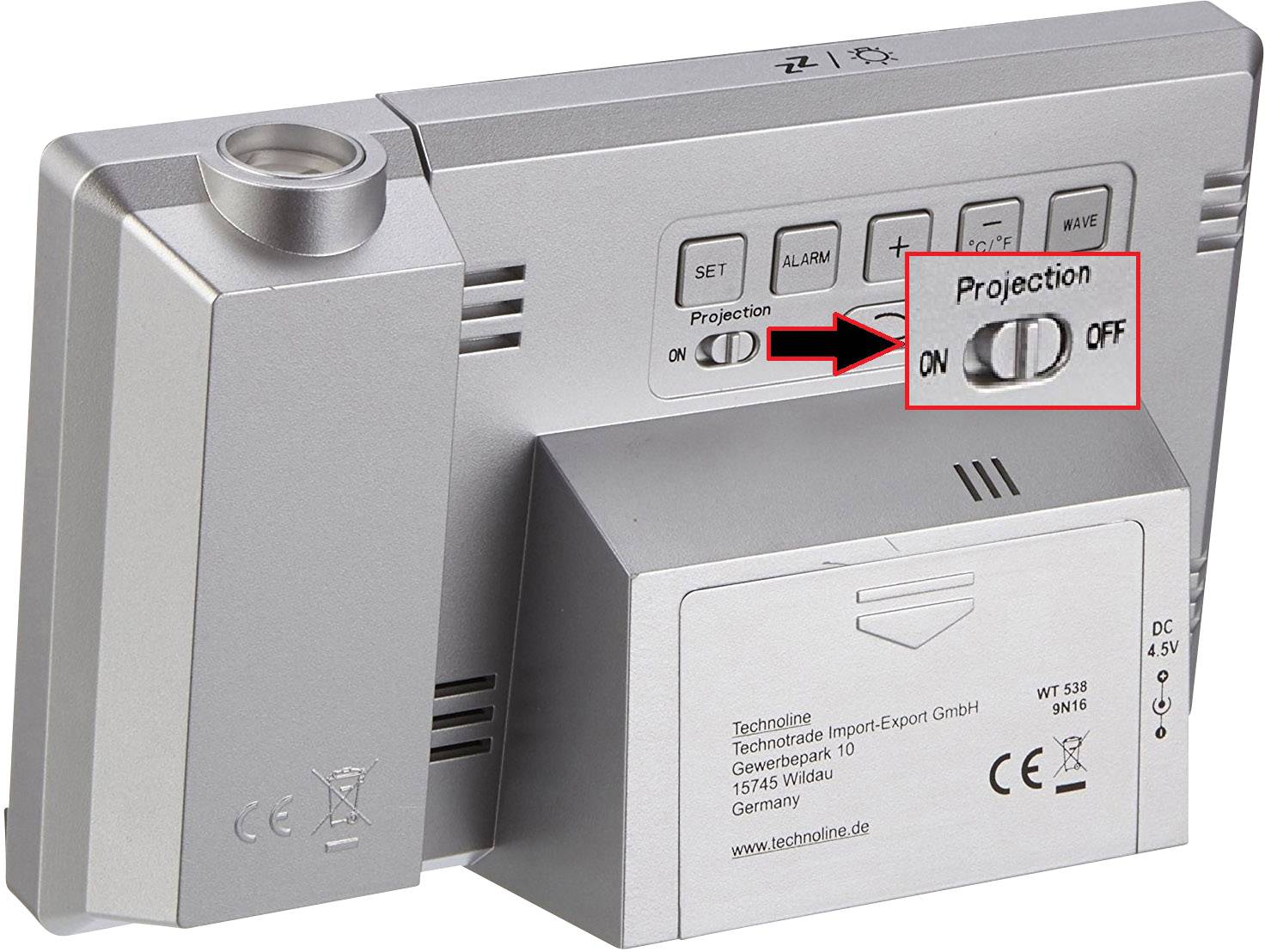 Projection clock in silver. Focus is on the toggle switch for projection function with the marking 'Projection ON/OFF'.