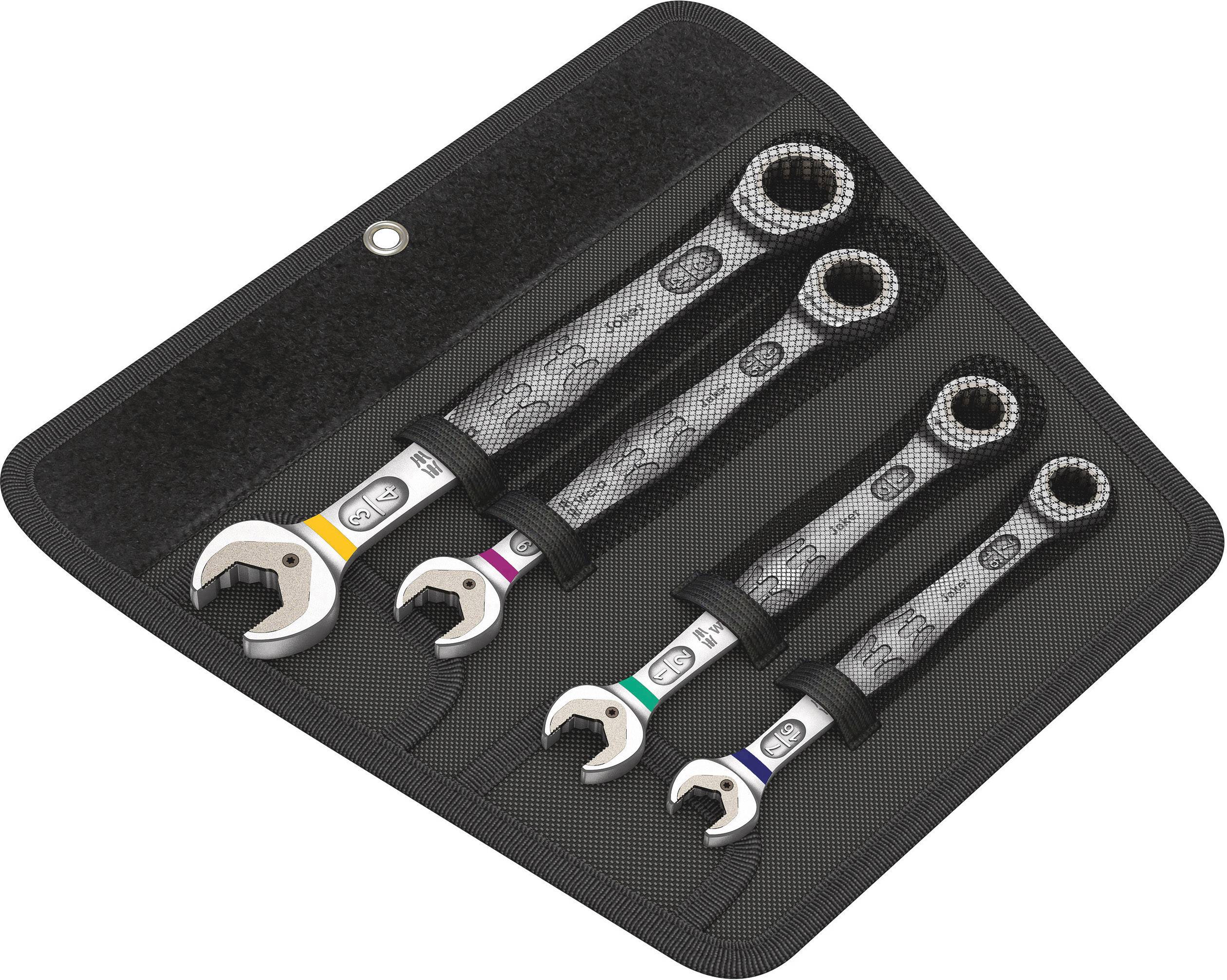 Four open ring spanners in various sizes are neatly arranged in a black roll-up tool bag, ideal for tool use.
