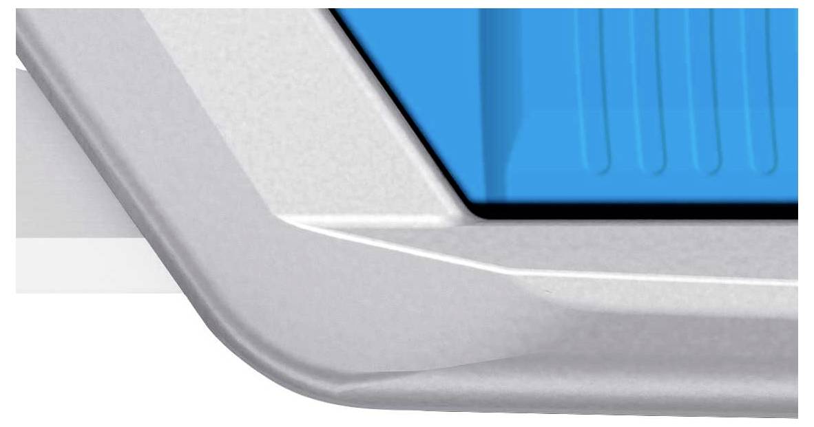 A section of a technical device in silver and blue, revealing a corner with structured lines and smooth surfaces.