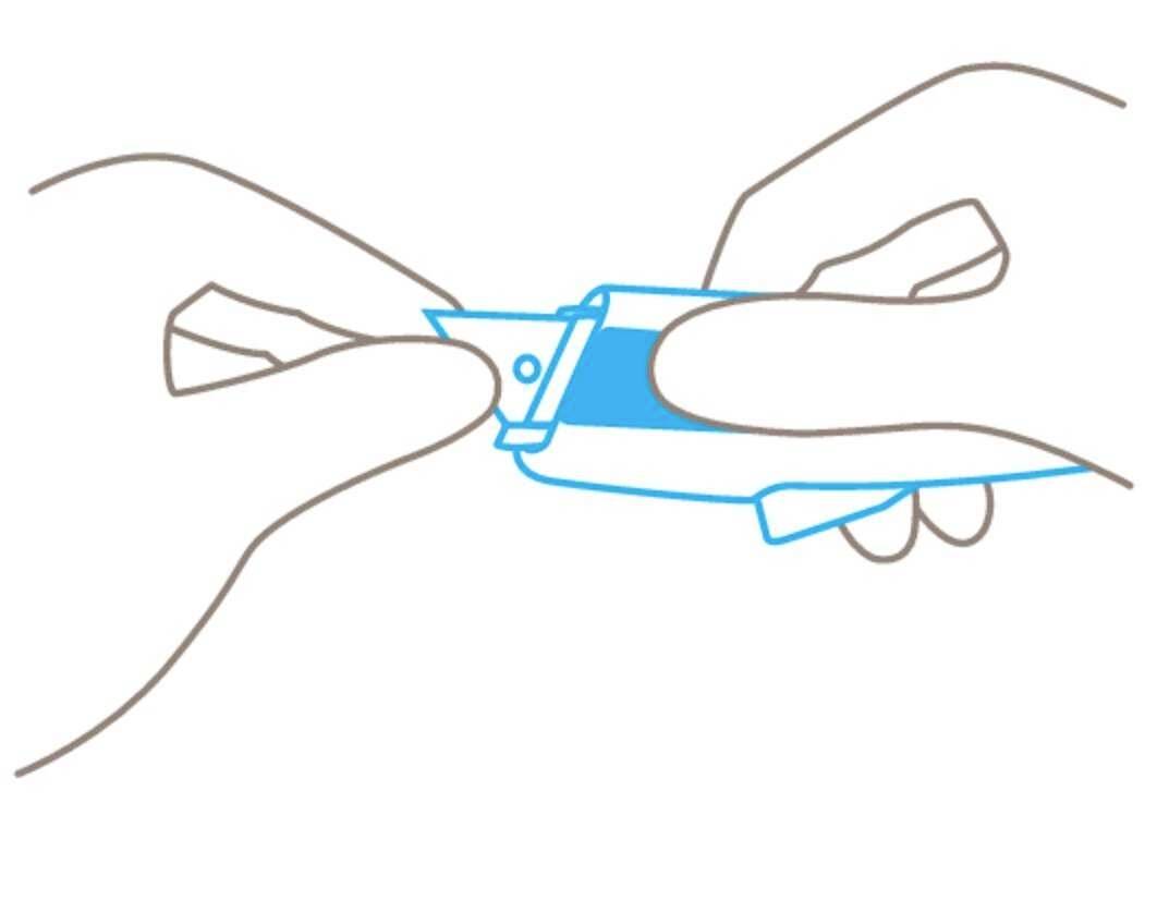 Two hands open a blue package by pulling on the tabs.
