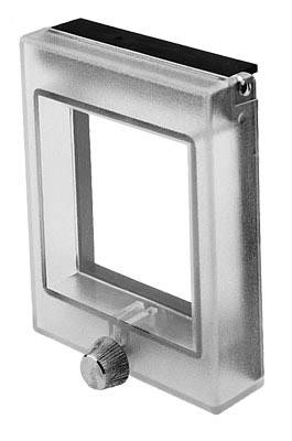 Plastic diabetes meter with a rectangular shape, clear casing and black border at the top. Adjustment wheel located on the underside.