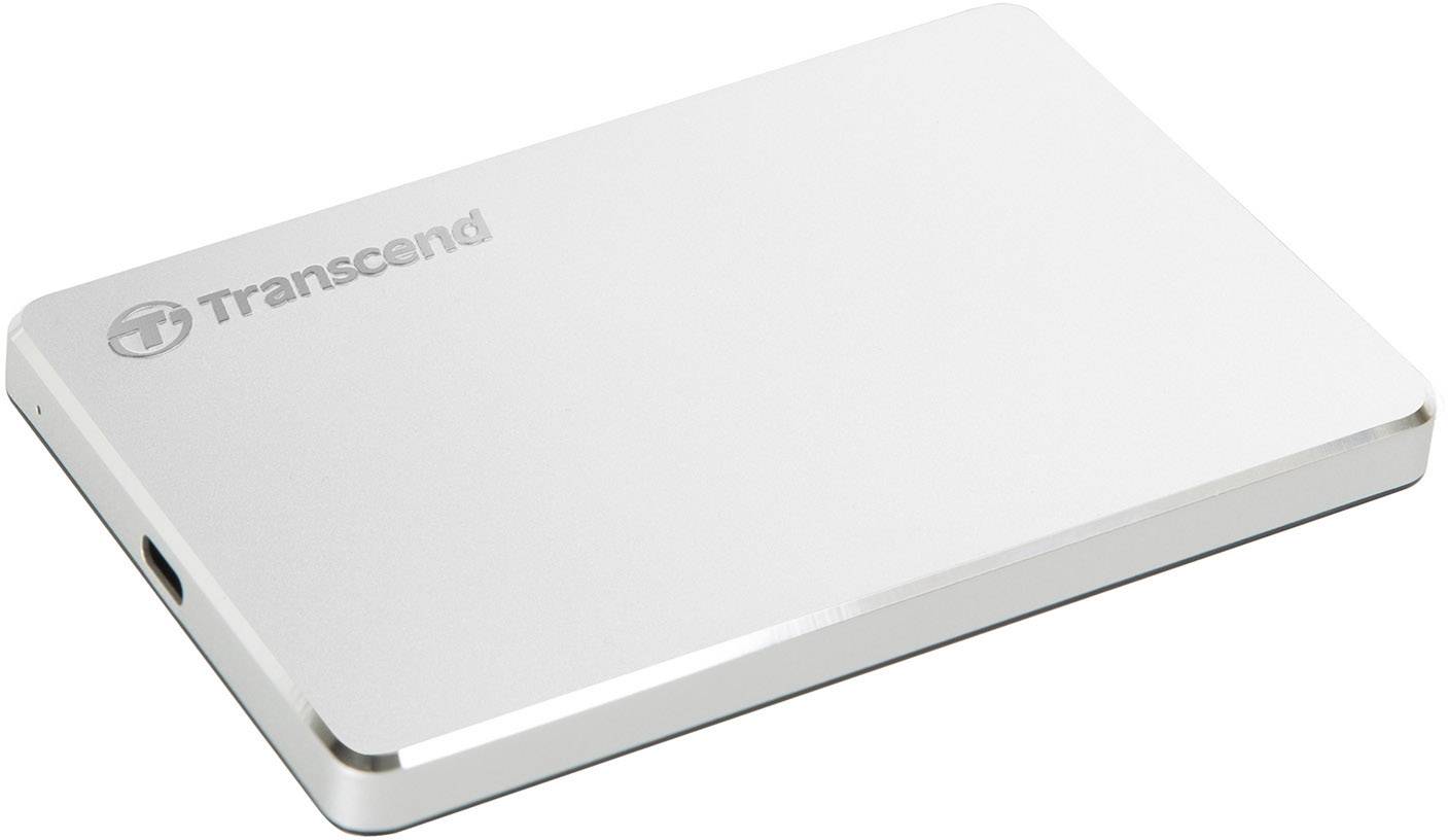 A silver external hard drive by Transcend with a slim design and a USB port on the side.