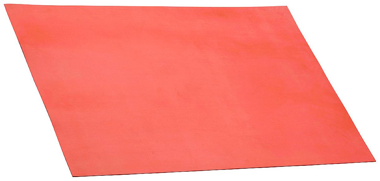 A red, rectangular piece of material, possibly a mat or fabric, lies flat on a surface.