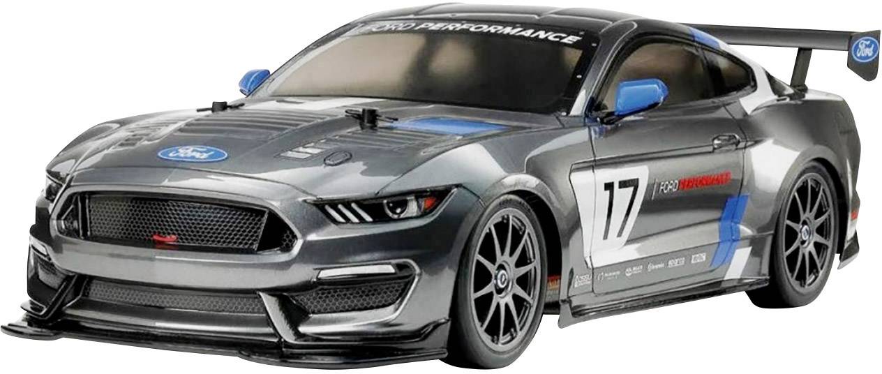 Grey remote-controlled car in sports design with blue and black details. Number '17' on the side, Ford logo at the front and on the roof.