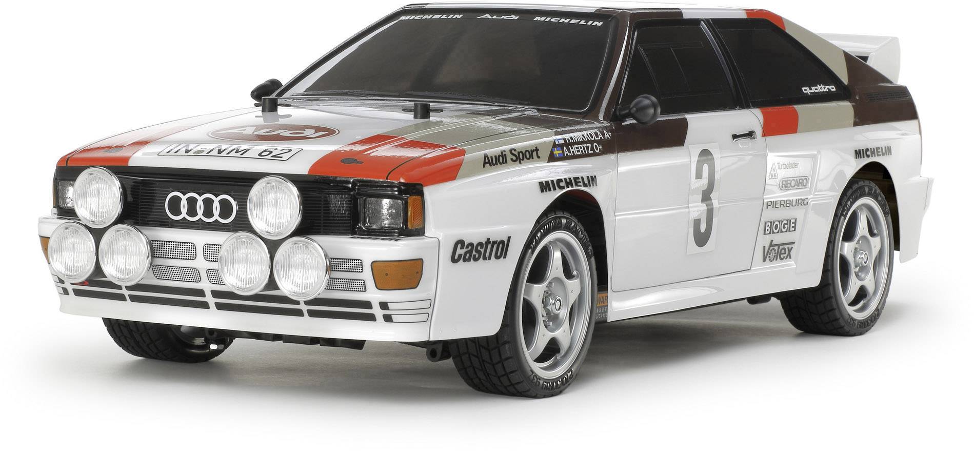 A rally car in classic design with sponsor logos such as Audi, Castrol, and Michelin, displaying race number 3.