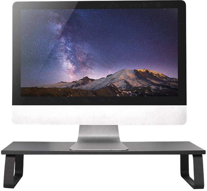 A computer screen displays an image of mountains in the foreground and a star-covered night skyline in the background.