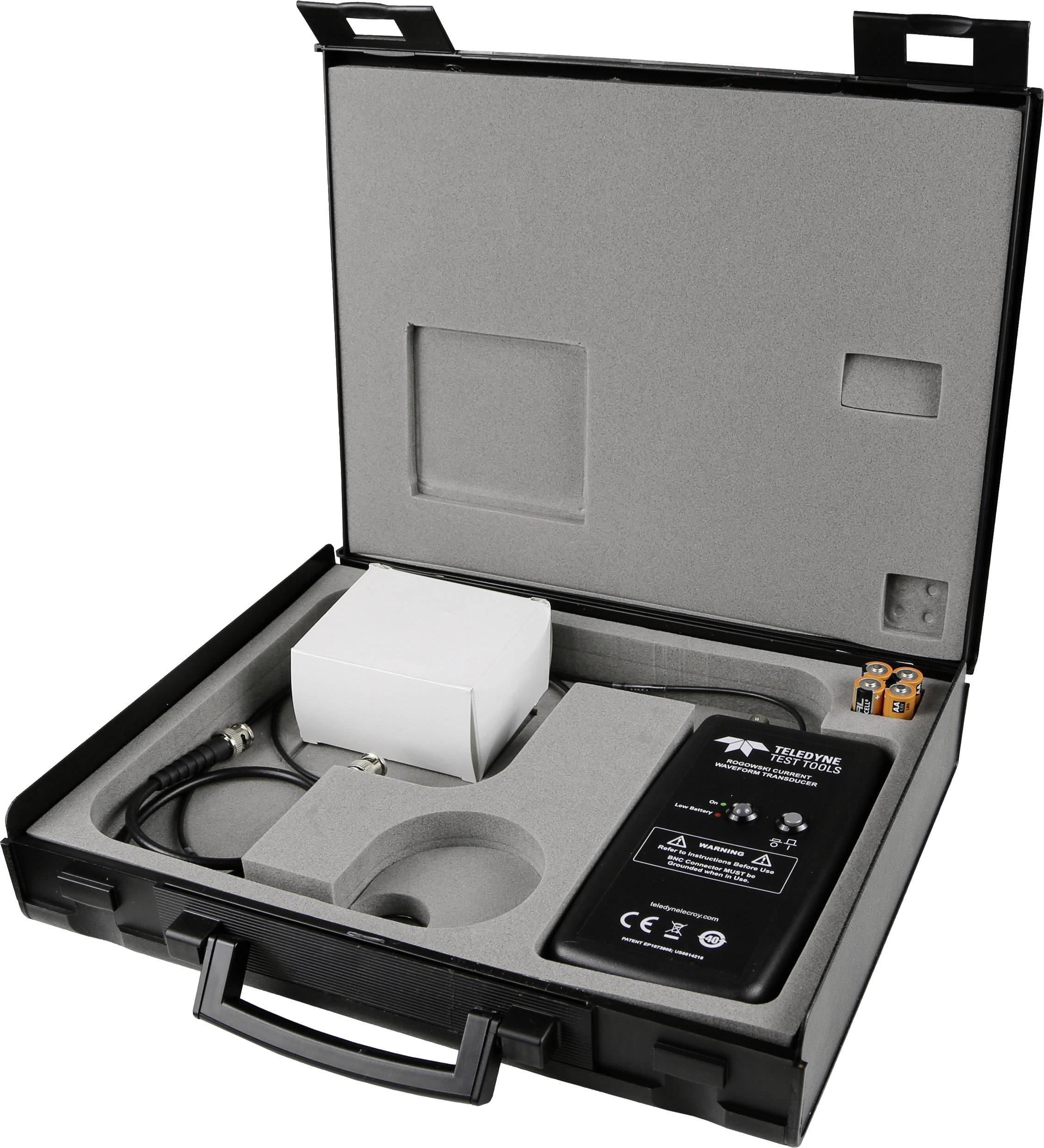 Portable diagnostic case with technical equipment, cables, and batteries in foam-lined compartments. Ideal for mobile repair work.