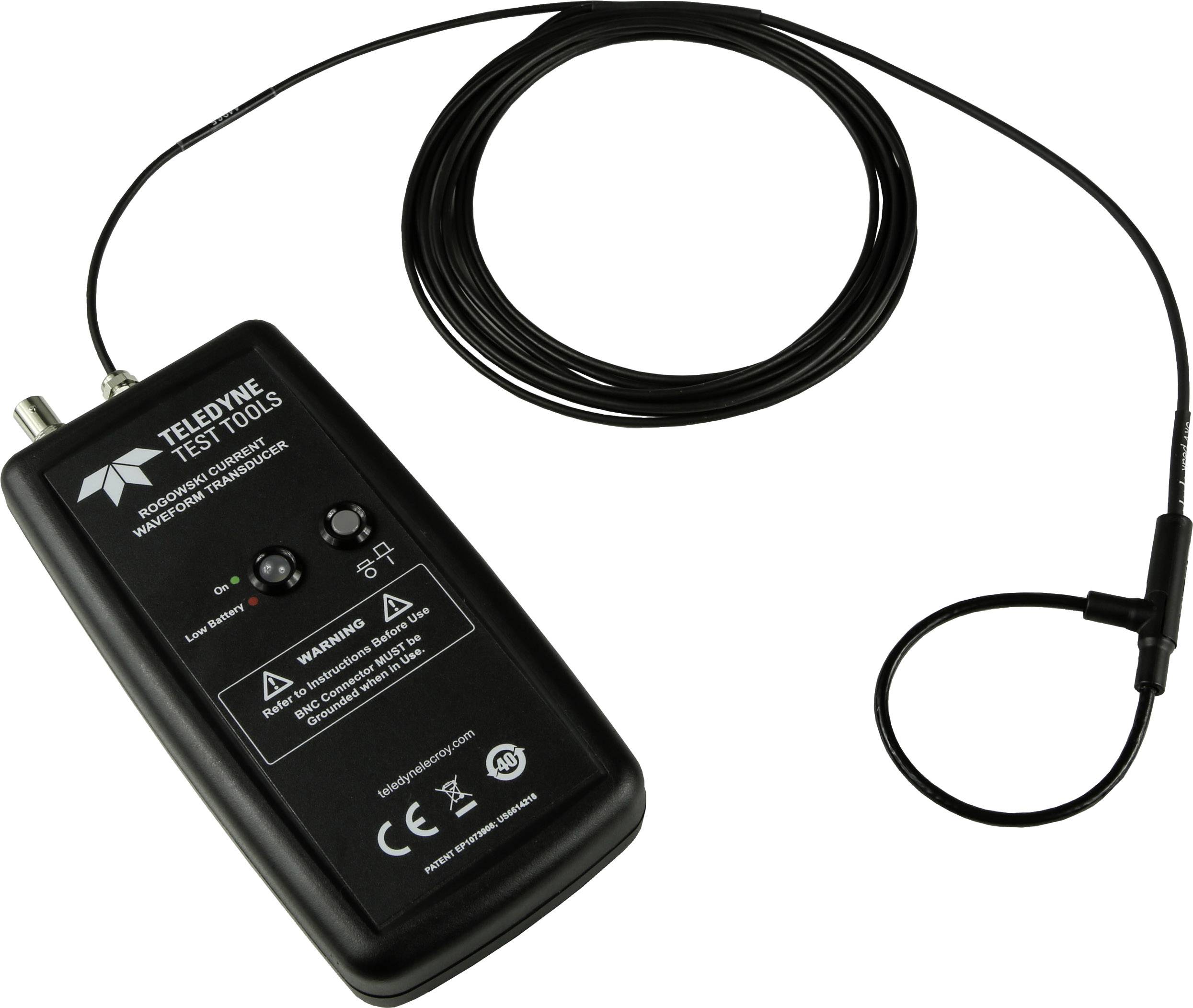 An electrical testing device with a cable and sensor. The device displays operational indicators and safety markings on the front panel.