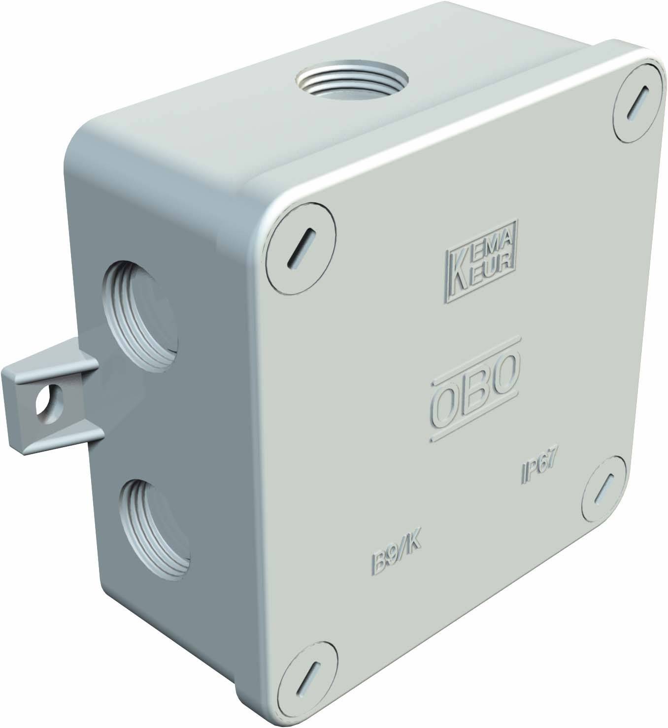 A grey-white plastic junction box with side openings and screws at the corners, suitable for electrical installations.