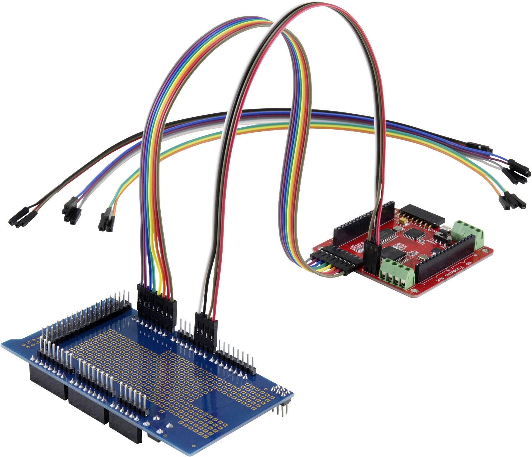 A blue and a red electronic circuit board, connected by several coloured cables, on a white background.