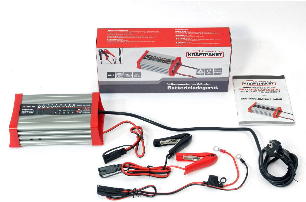 Battery charger with packaging and instructions. Includes cable with clamps. Numbers on device show charging settings.
