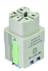 Grey electrical component with multiple terminals and a green marking on the side, designed for installation in technical devices.