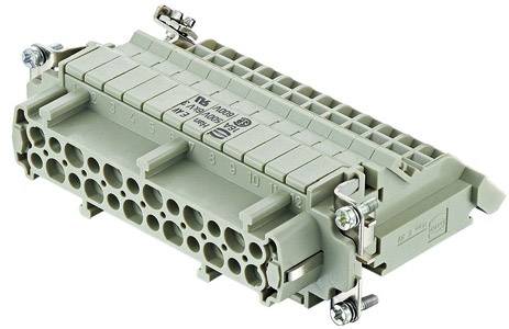 A grey electrical connector with multiple round terminals, labelled with technical specifications and securing screws.