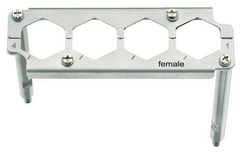 Metal frame with four hexagonal openings, labelled 'female' and numbers. Used for specific industrial or technical applications.