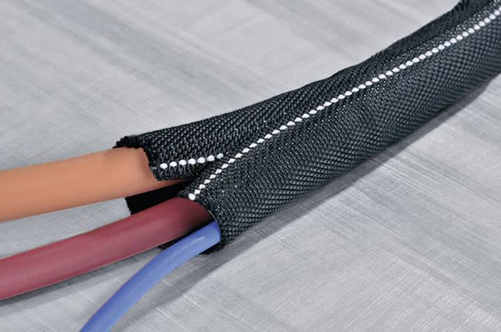 Black protective sleeve encases three colourful cables: orange, red, and blue. The sleeve has a seam running down its centre.