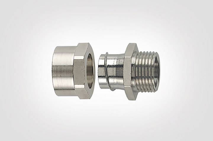 Two metal components of a thread: On the left, a hexagonal nut with internal thread, on the right a connecting piece with external thread.