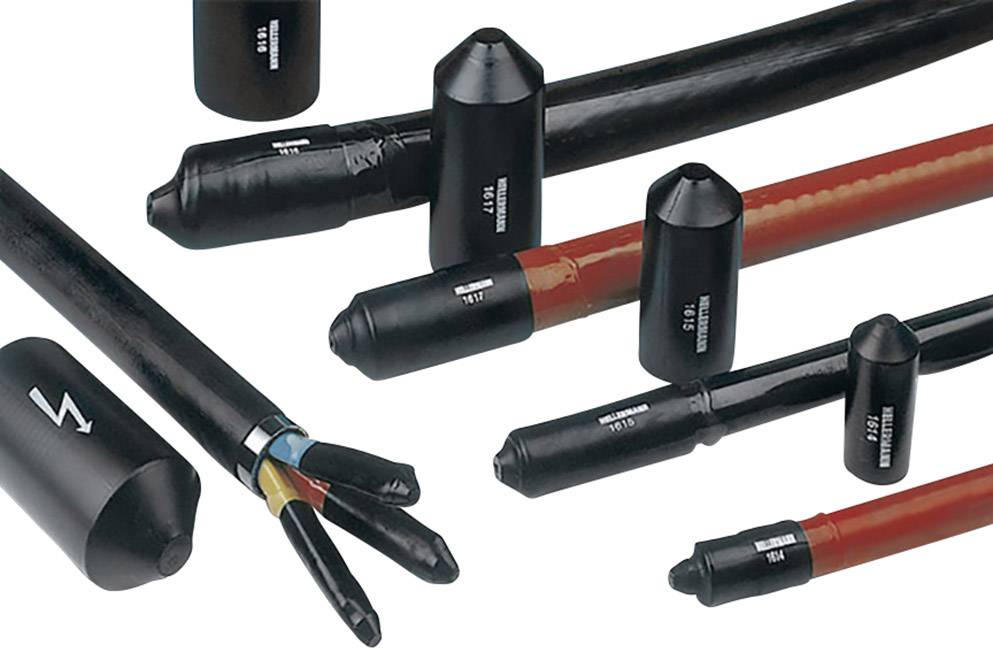 A selection of heat-shrink caps on various cables, used for sealing and protecting cable ends.