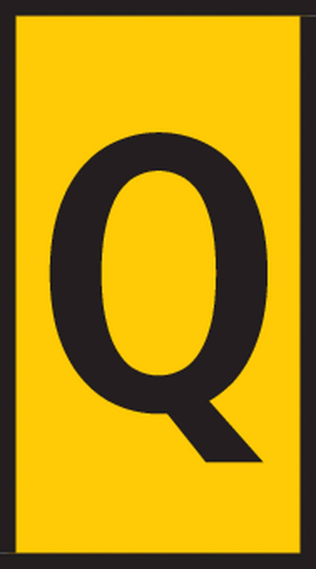 Yellow sign with a large, black letter 'Q' in the centre.