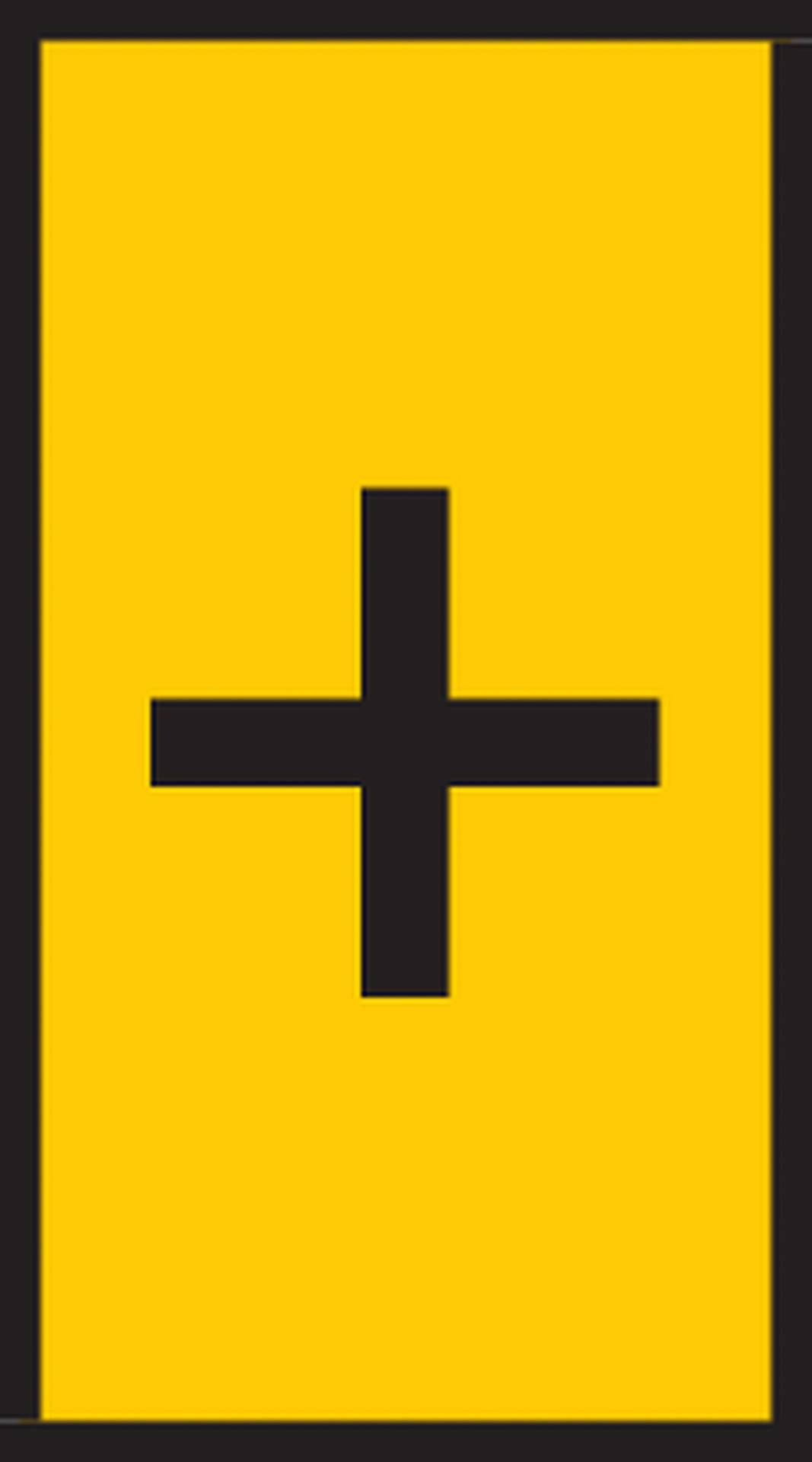 Yellow sign with a black plus sign in the centre.