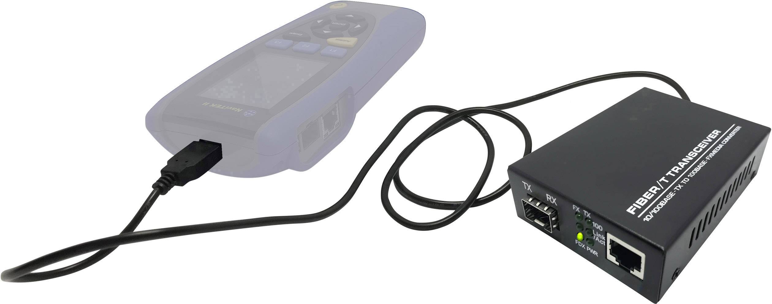 A fibre optic converter with two Ethernet ports and a fibre optic connection. Connected to a portable test device via a USB cable.