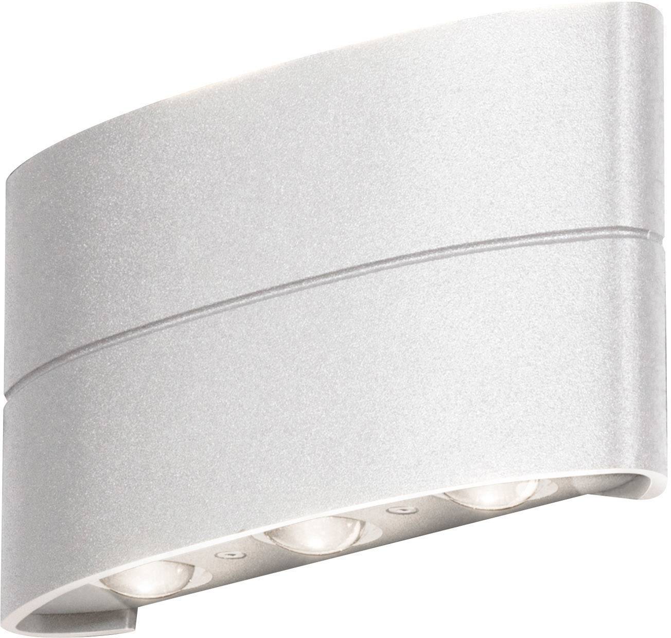 Silver, curved wall light with three integrated light sources on the underside, which shine evenly downwards.