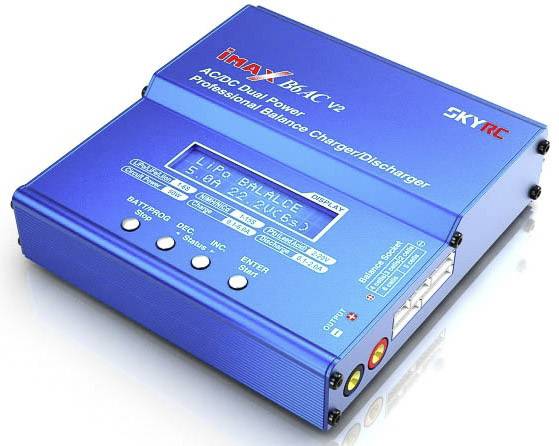 Blue charger with display and control buttons. It displays information about 'LiPo Balance'. Brand name with printed text 'iMAX B6AC V2' visible.