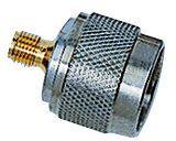 A metal adapter for pressure hoses with a corrugated surface and a gold-coloured push-fit connector.