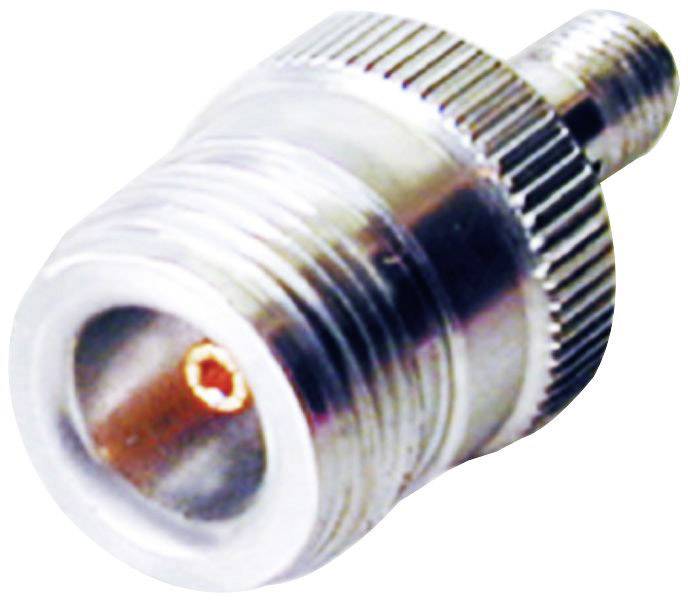 A silver, metallic adapter or plug with a knurled edge and a centrally located opening for cable connection.