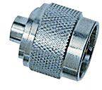 A silver metal adapter or plug with a ribbed surface, cylindrical body, and two different connectors.