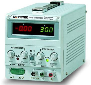 A programmable laboratory power supply shows -0.00 volts and 30.0 amperes. Buttons for fine-tuning voltage and current are present.