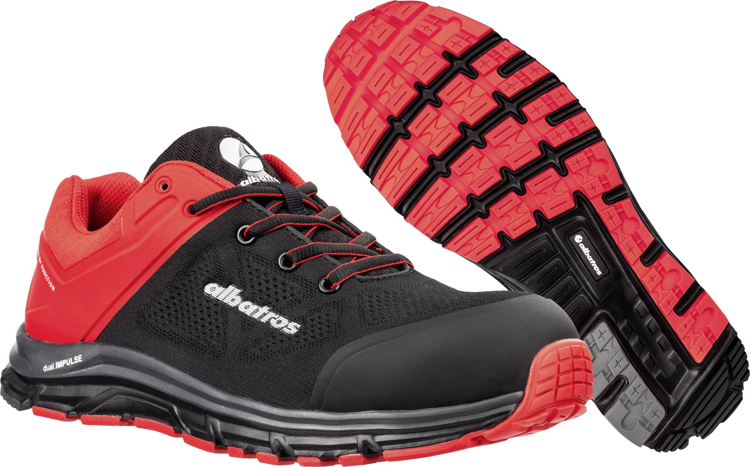 A pair of black and red sports trainers, shown from the side and underneath, with a sturdy sole and distinctive design, suitable for outdoor activities.