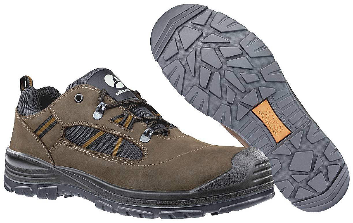 Brown work shoes with a robust rubber sole and lace-up design, suitable for secure grip and protection at work.
