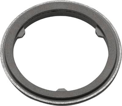 A metallic ring with a narrow rim and dark inner section, presumably a machine component or seal.