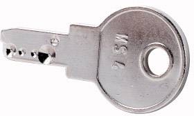 A silver key with a round head and multiple notches along the shaft, lying down, shows an engraved number and letter on its top surface.