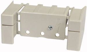 A beige electrical fuse holder with three mounting holes and a small lightning symbol on the front.