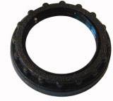 A black, round plastic ring lies on a white background. The ring has small notches around its edge.