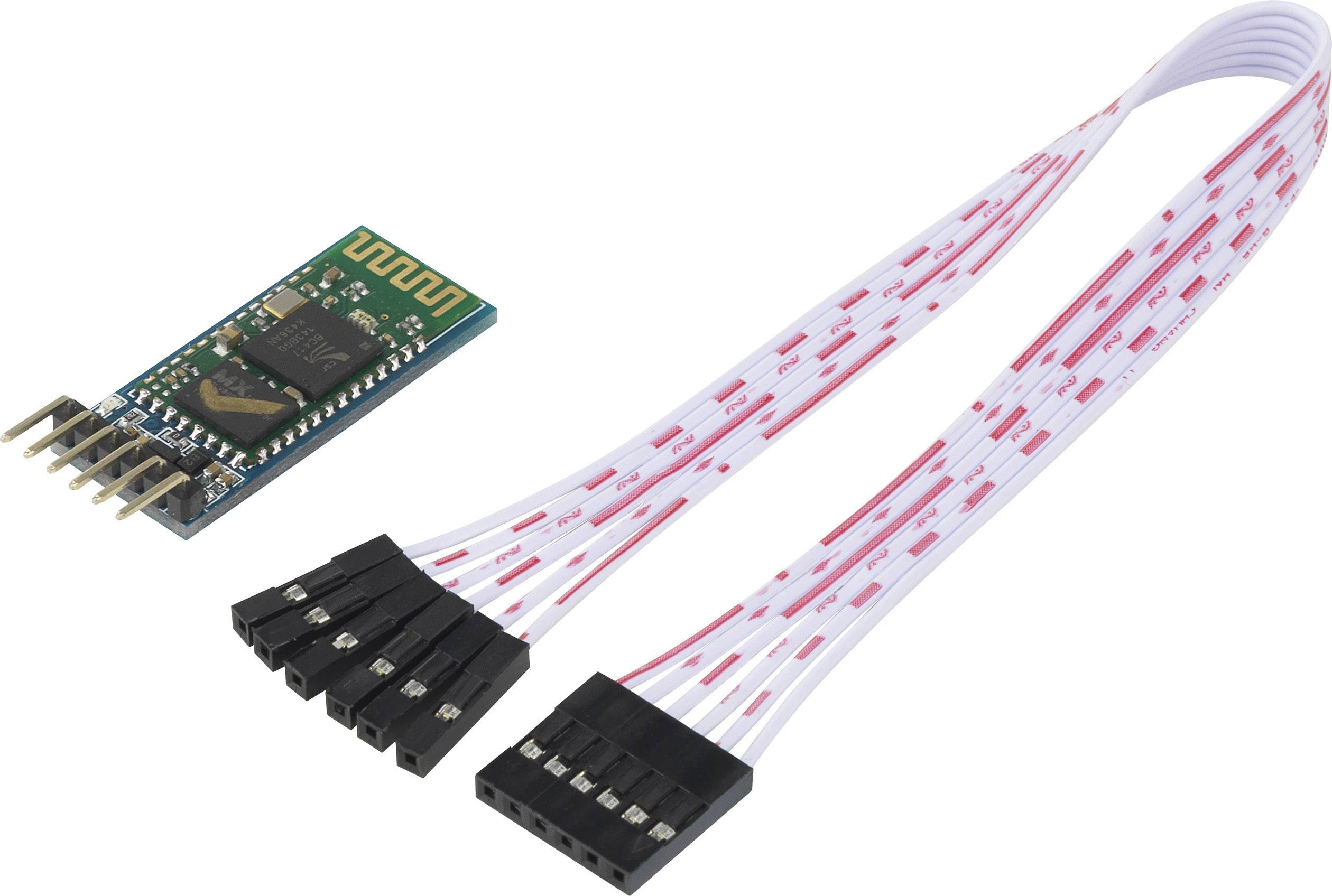 A microcontroller board with a Bluetooth module and a bundle of several colourful cables with connectors.