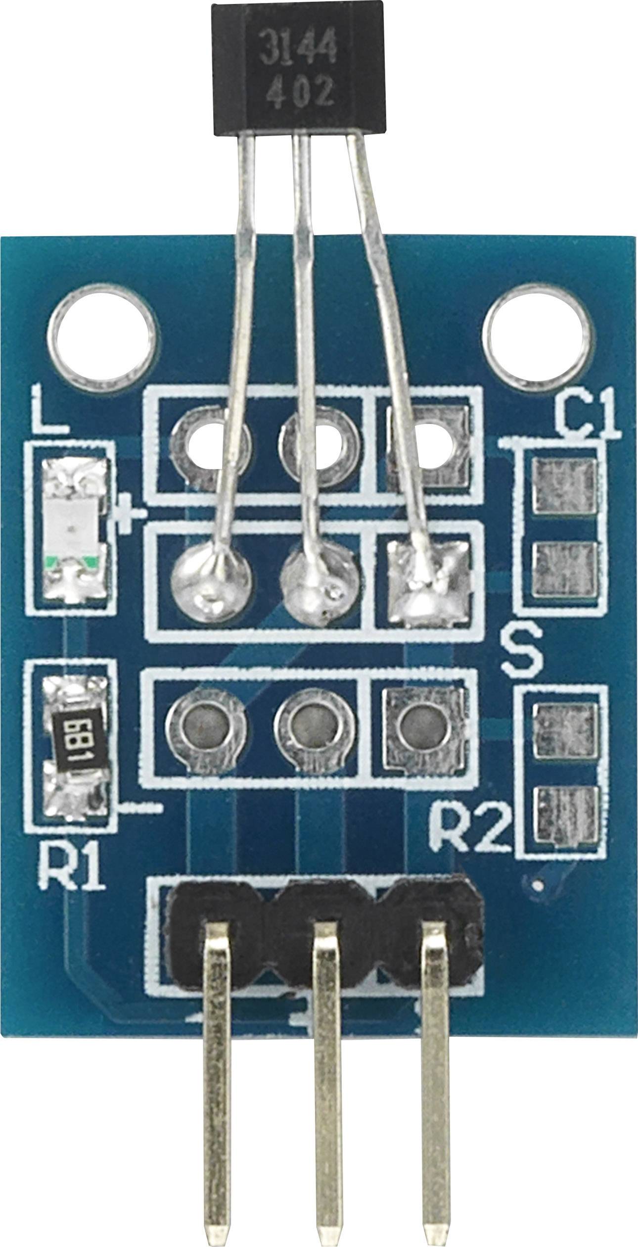 Blue electronic module with transistor and various components such as resistors and pin headers.