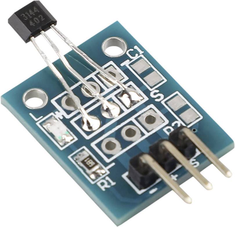 An electronic module with a transistor and three pins on a printed circuit board; commonly used for sensor applications.