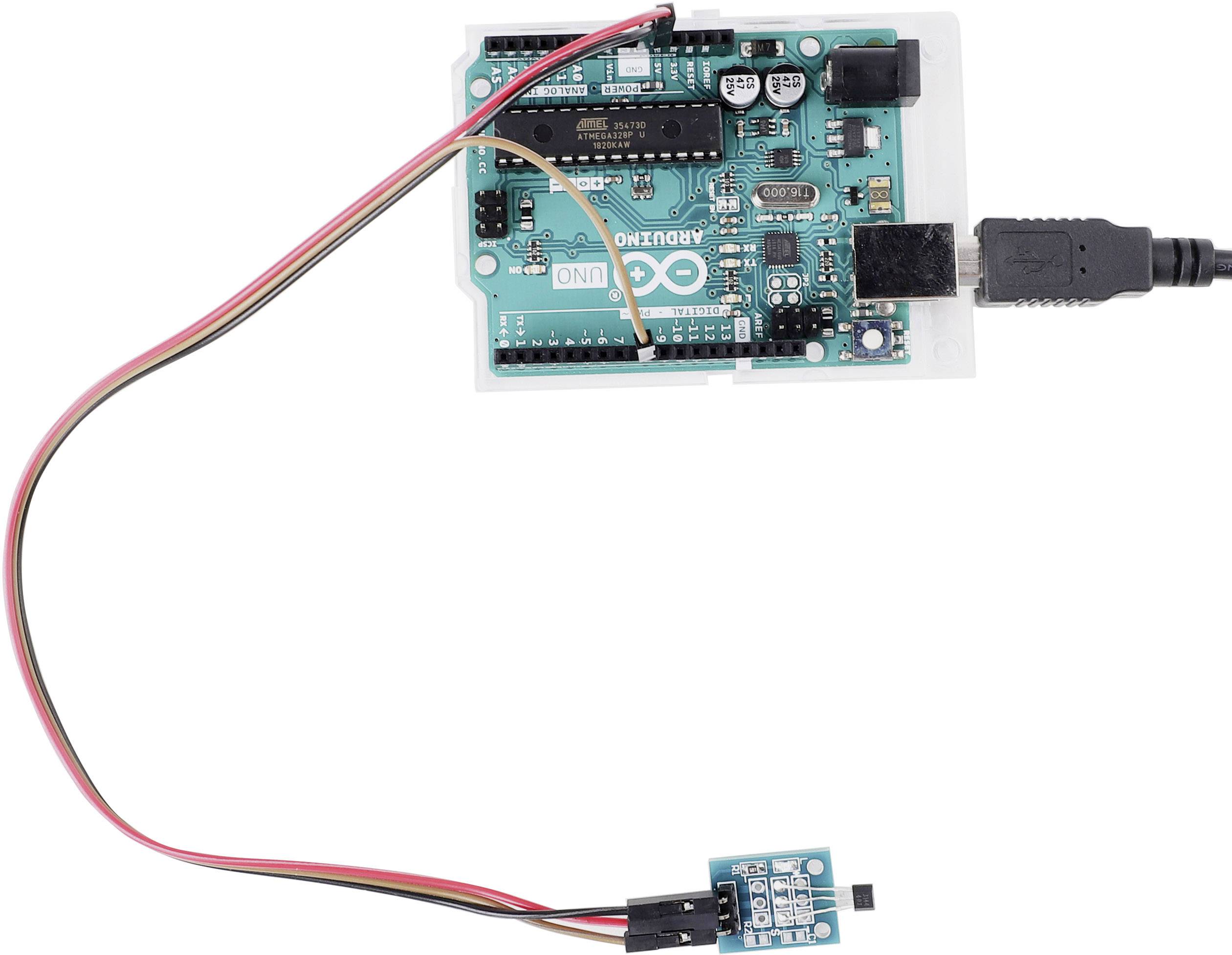 An Arduino UNO board connected to an external sensor via cables. The sensor appears to be electrically connected and ready for operation.